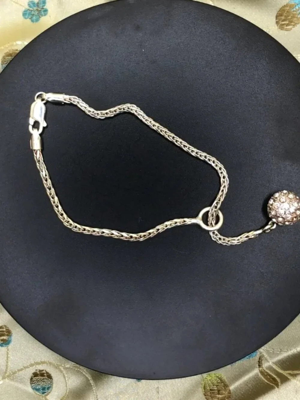 8 inch sterling silver lariat slide bracelet with rhinestone glitter ball. 8+ gr
